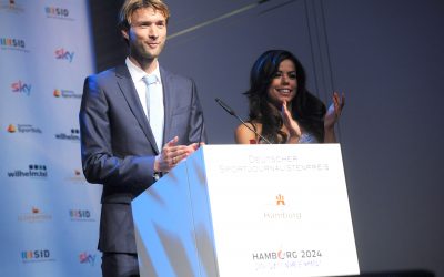 Simon Rolfes, Fernanda Brandao 
Deutscher Sportjournalistenpreis im Hotel Grand Elysee in Hamburg am 05.10.2015
Foto: BrauerPhotos © Oliver Walterscheid